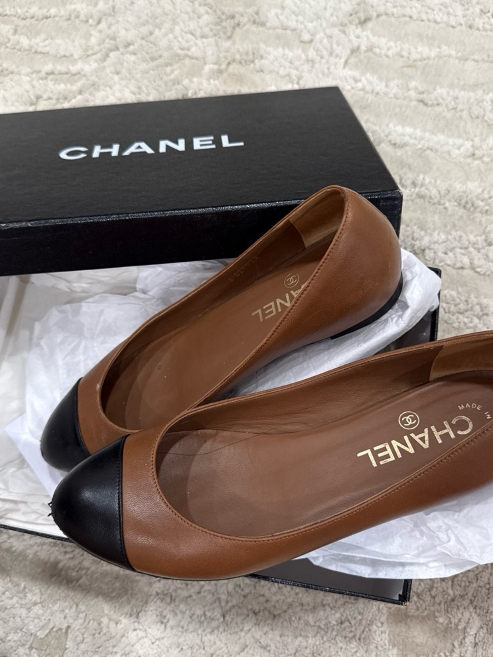 CHANEL Brown Leather Ballet Flats with Black Cap Toe